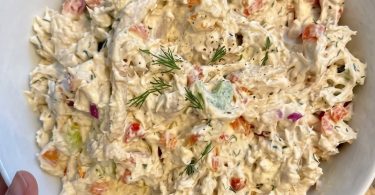 Deli-style chicken salad served in a bowl